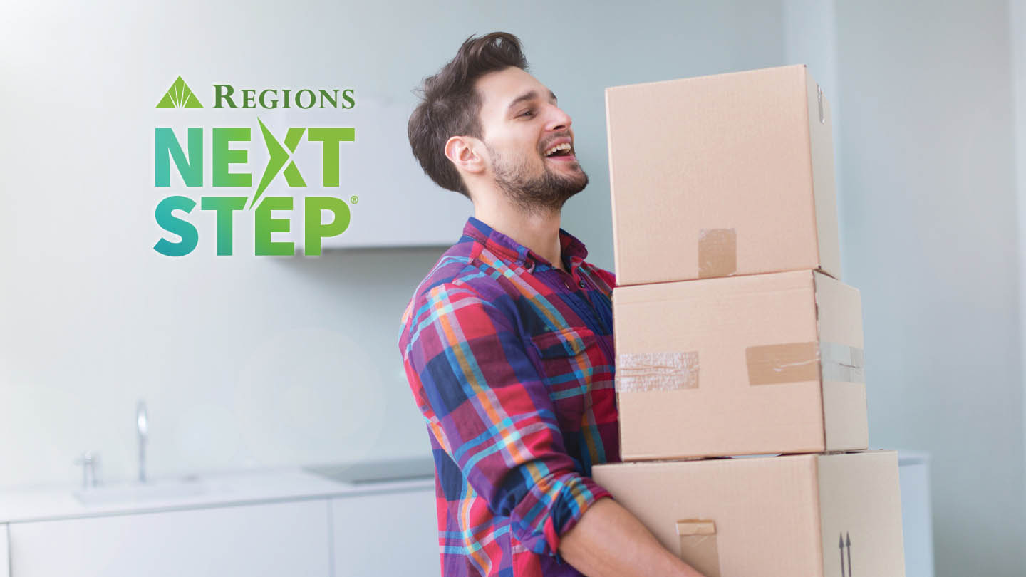 person in house carrying moving boxes with Regions Next Step logo