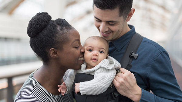 biracial couple with adopted child
