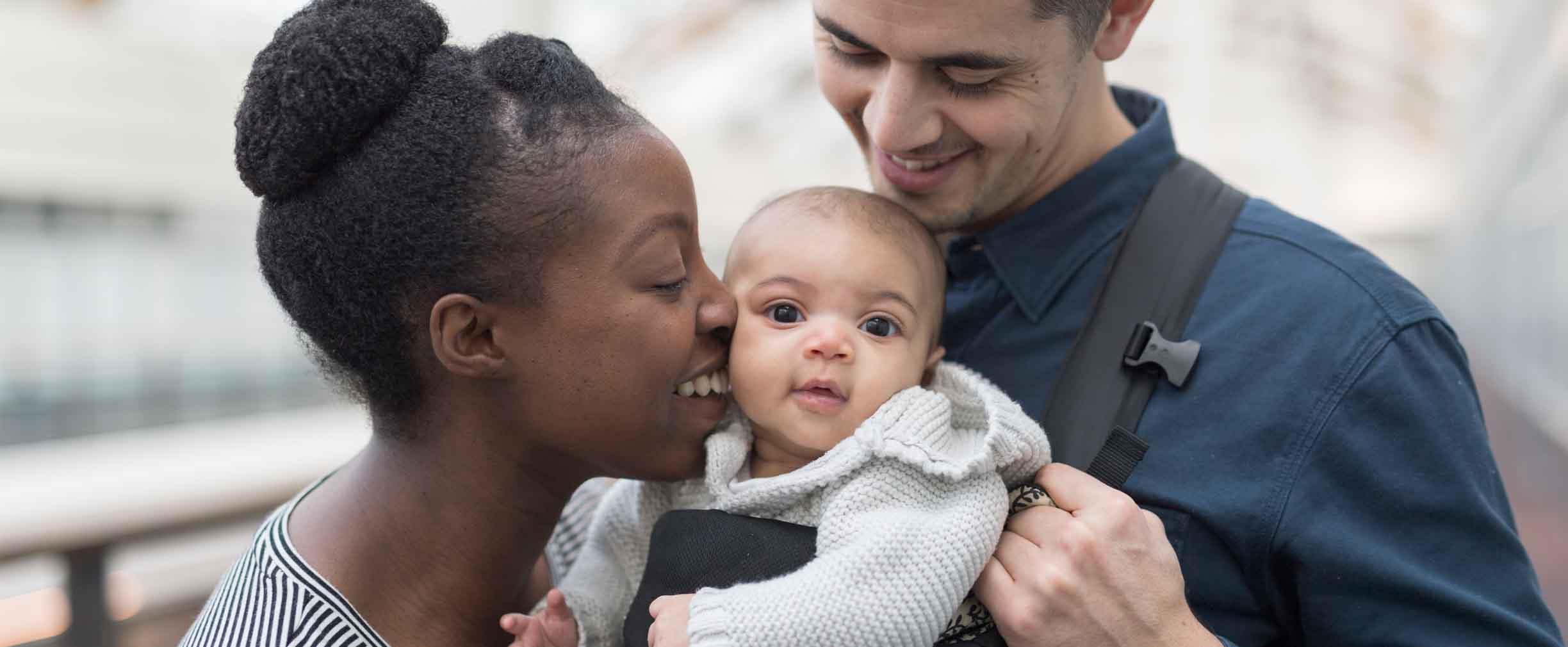 biracial couple with adopted child