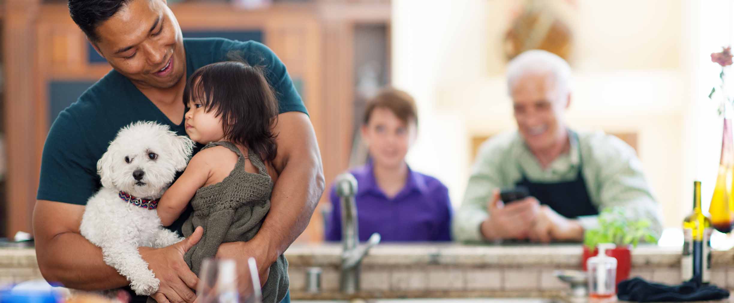 family gathered in the kitchen