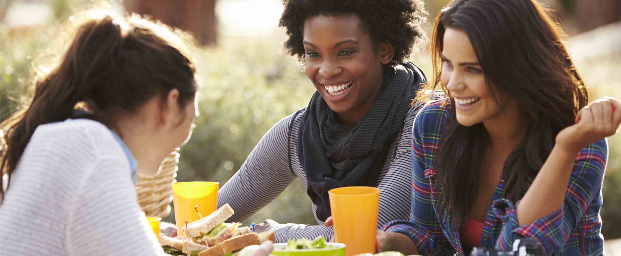 women discussing how to build wealth