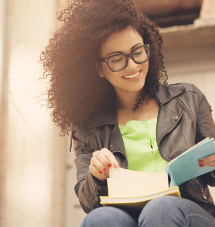 african american girl reading a book