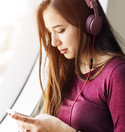 woman listening to headphones