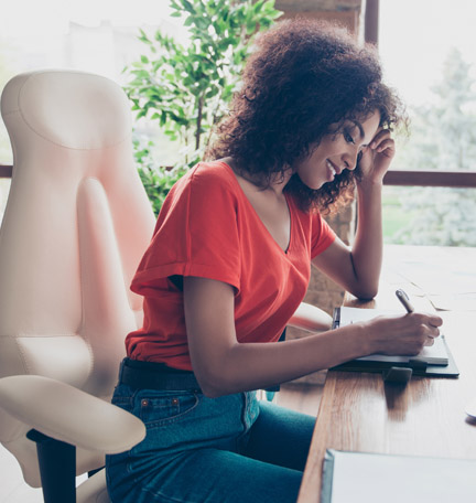 female young professional working at her desk