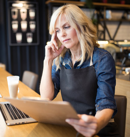 small business owner working on computer