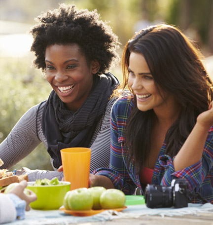 women discussing how to build wealth