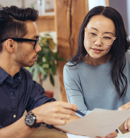 couple reviewing estate plan with advisor