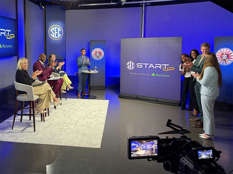 Participants applaud during an SEC Start Up event presented by Regions.